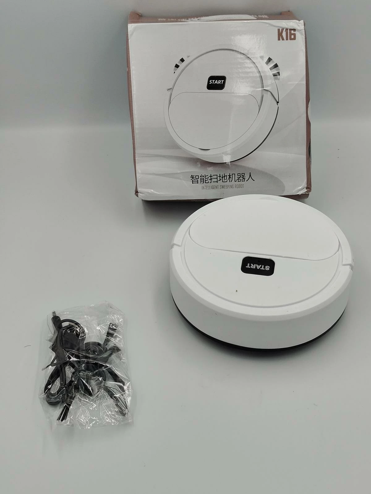 mini-odkurzacz-samojezdzacy-bialy-stan-uzywany