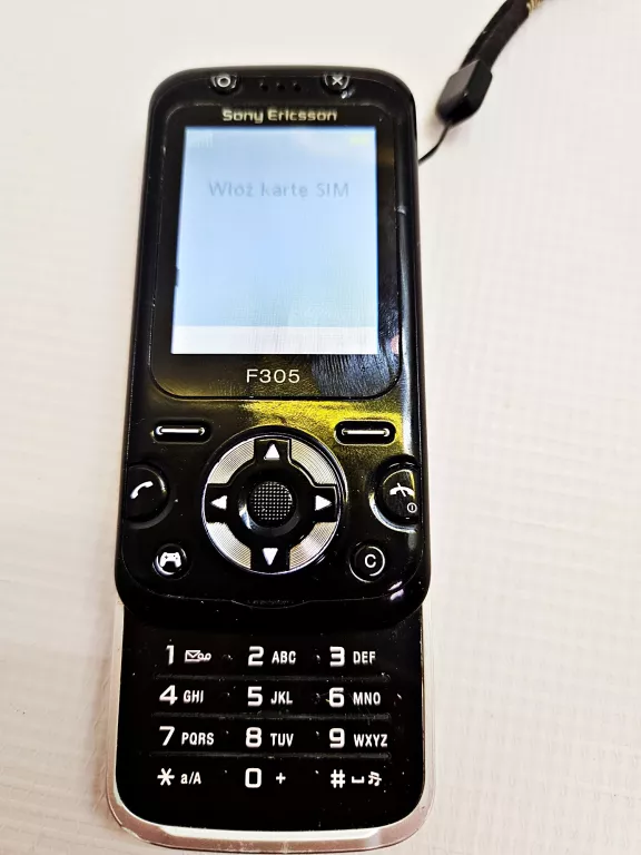 TELEFON SONY ERICSSON F305 ORANGE + ŁAD/SŁUCHAWKI