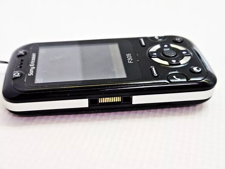 TELEFON SONY ERICSSON F305 ORANGE + ŁAD/SŁUCHAWKI