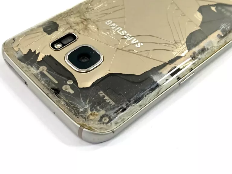 SMARTFON SAMSUNG GALAXY S7 4/32GB ZŁOTY - GUBI SIEĆ / GRZEJE SIĘ!!