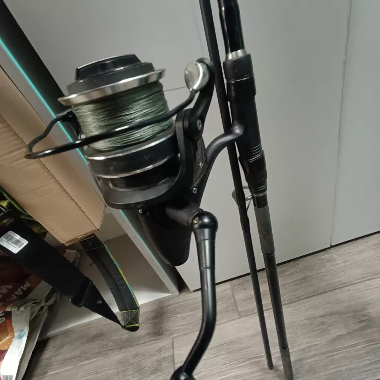 WĘDKA DAIWA BLACK WIDOW BWC2300-AU REACHER KOŁOWROTEK POKROWIEC