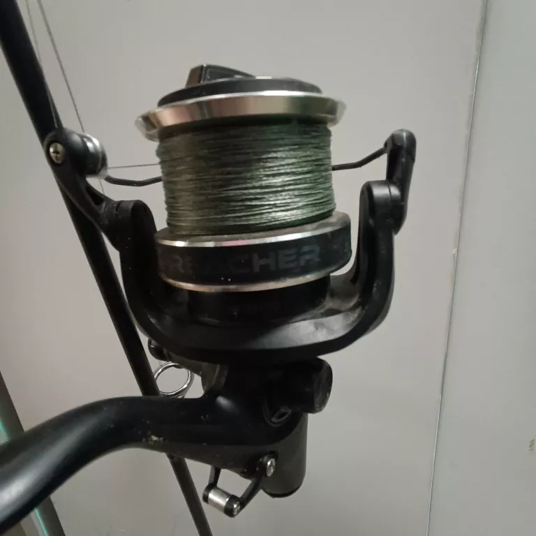 WĘDKA DAIWA BLACK WIDOW BWC2300-AU REACHER KOŁOWROTEK POKROWIEC