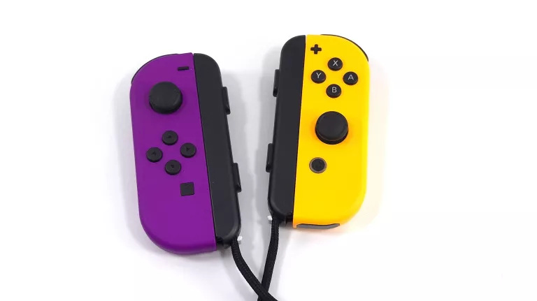 KONTROLERY JOY-CON PAIR DO NINTENDO SWITCH + UCHWYT POWERA MARIO