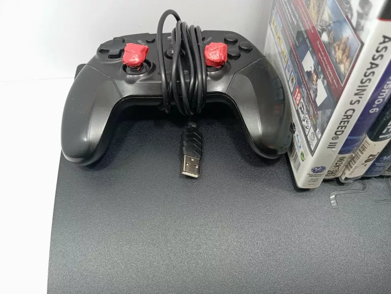 KONSOLA  PS3 SLIM Z 6 GRAMI I USZKODZONY PAD