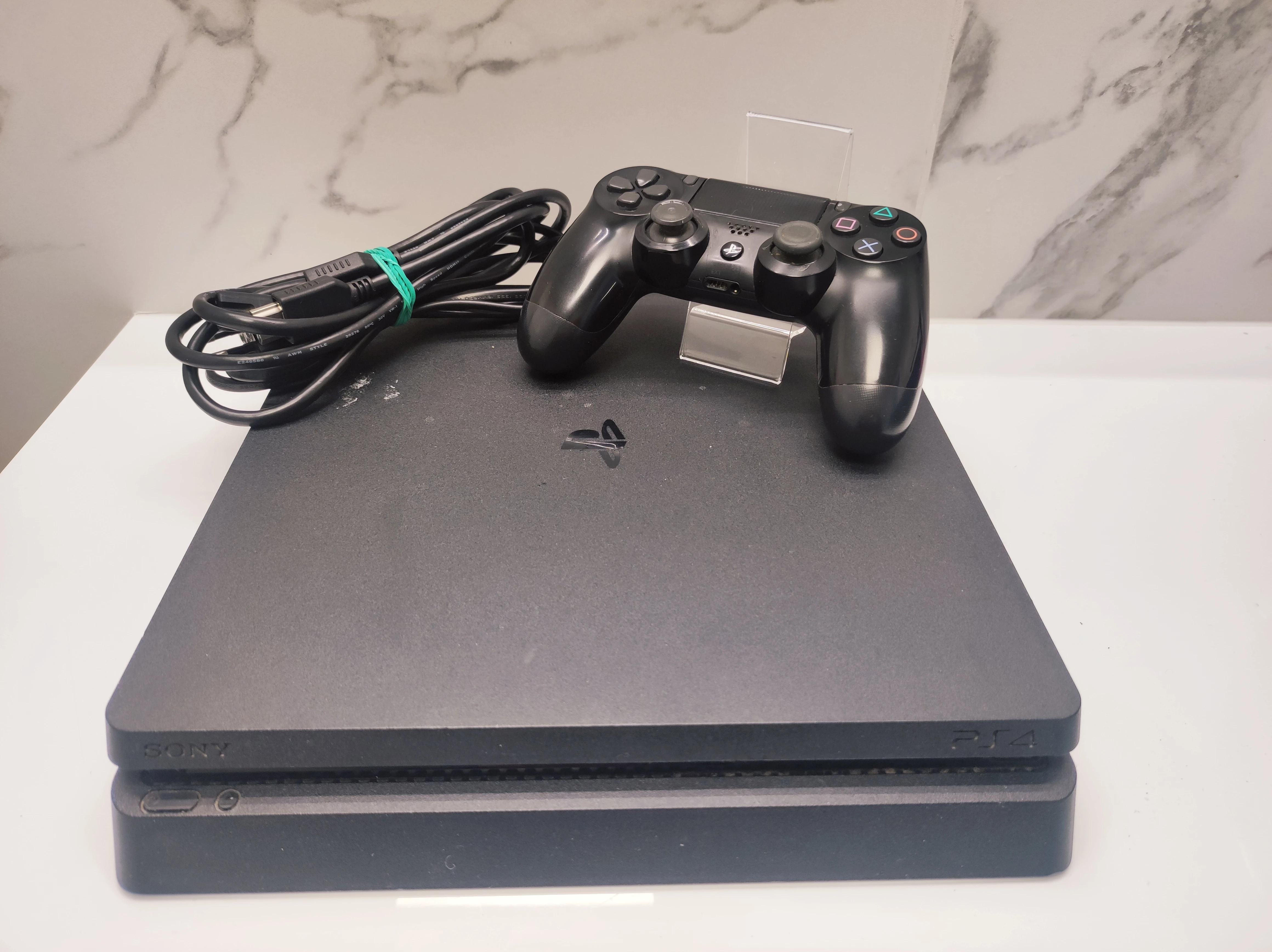 konsola-ps4-slim-cuh-2216a-orla-bialego-11u01-poznan