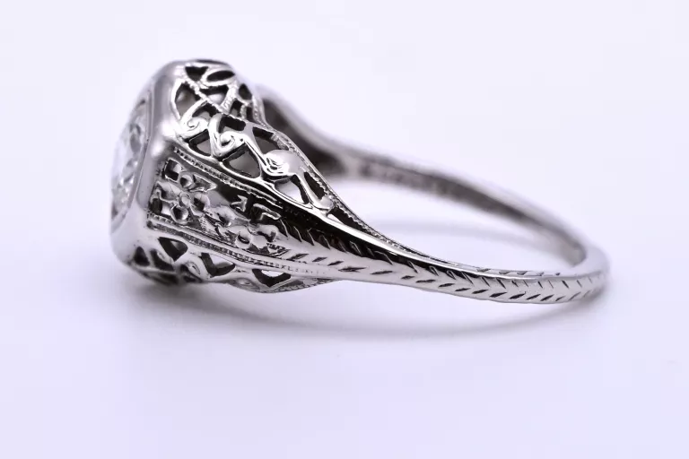 MISTERNY PIERŚCIONEK Z WIDOWISKOWYM BRYLANTEM 0,45CT ZŁOTO 750 R: 10