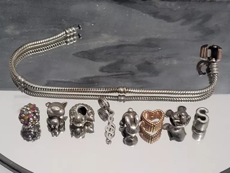 SREBRNA BRANSOLETKA PANDORA + 8 CHARMSÓW PR925 34,85 G