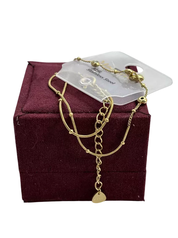 BRANSOLETKA ZE STALI CHIRURGICZNEJ POZŁACANA NA NOGĘ Z SERUSZKIEM