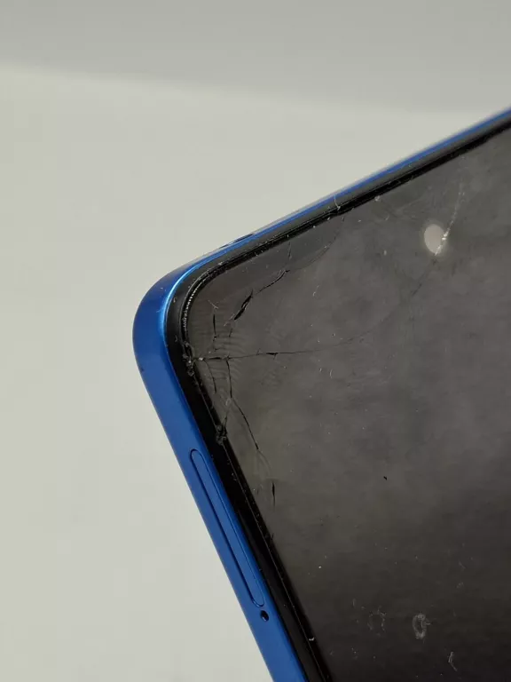 TELEFON MOTOROLA MOTO G04 ZBITY LEWY RÓG