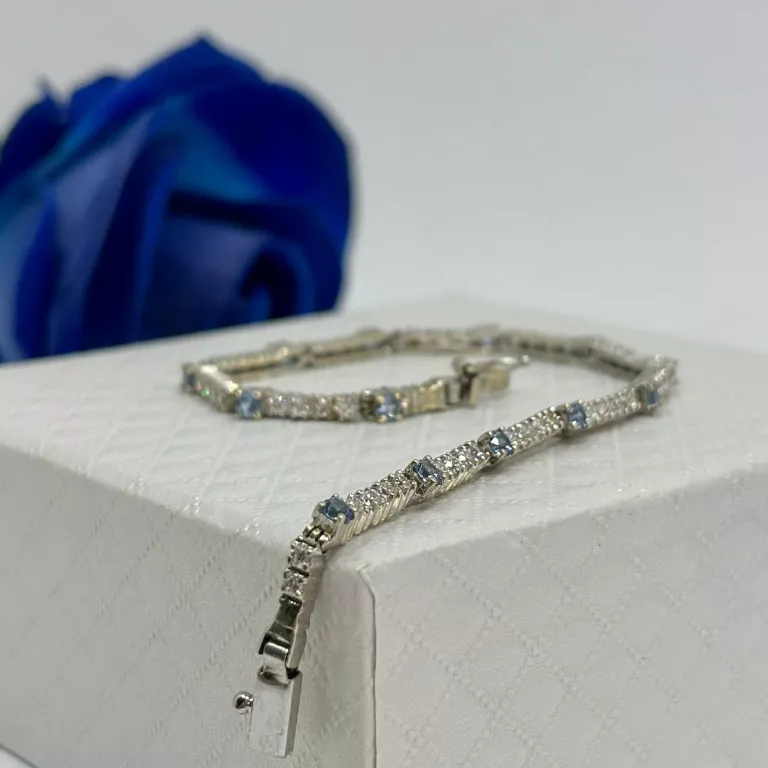 zlota-bransoletka-biale-zloto-niebieskie-cyrkonie-p585-976g-19cm-ean-gtin-045895345706