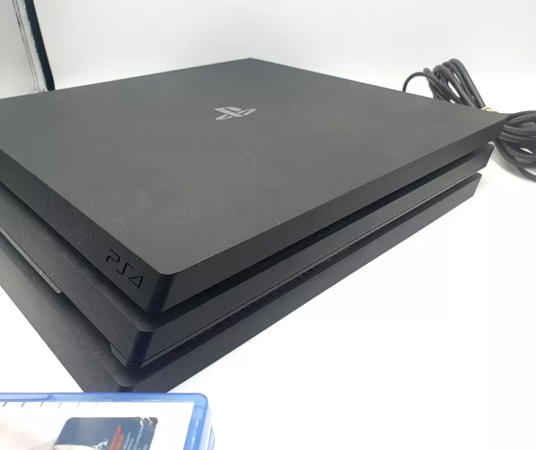 KONSOLA PLAYSTATION 4 PRO+ 2 PADY+ 2 GRY