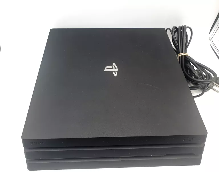 KONSOLA PLAYSTATION 4 PRO+ 2 PADY+ 2 GRY