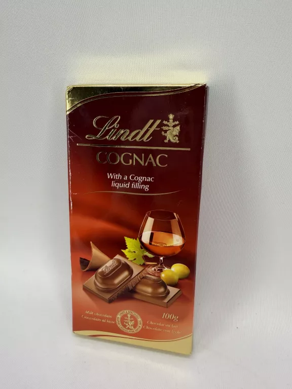 LINDT COGNAC CZEKOLADA MLECZNA Z PŁYNNYM NADZIENIEM KONIAKOWYM 100G