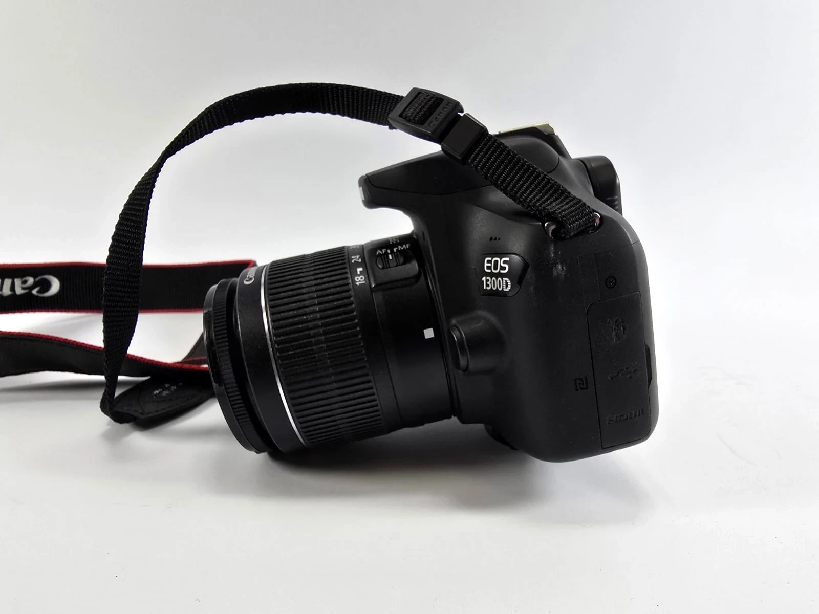 lustrzanka-canon-eos-1300d-korpus-obiektyw-torba-rozmiar-matrycy-206882-228774