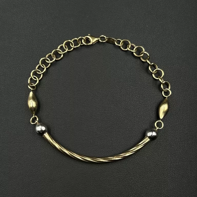 PIĘKNA ZŁOTA BRANSOLETKA ZE SZTYWNYM ELEMENTEM 333/8K/3,56 G/18 CM