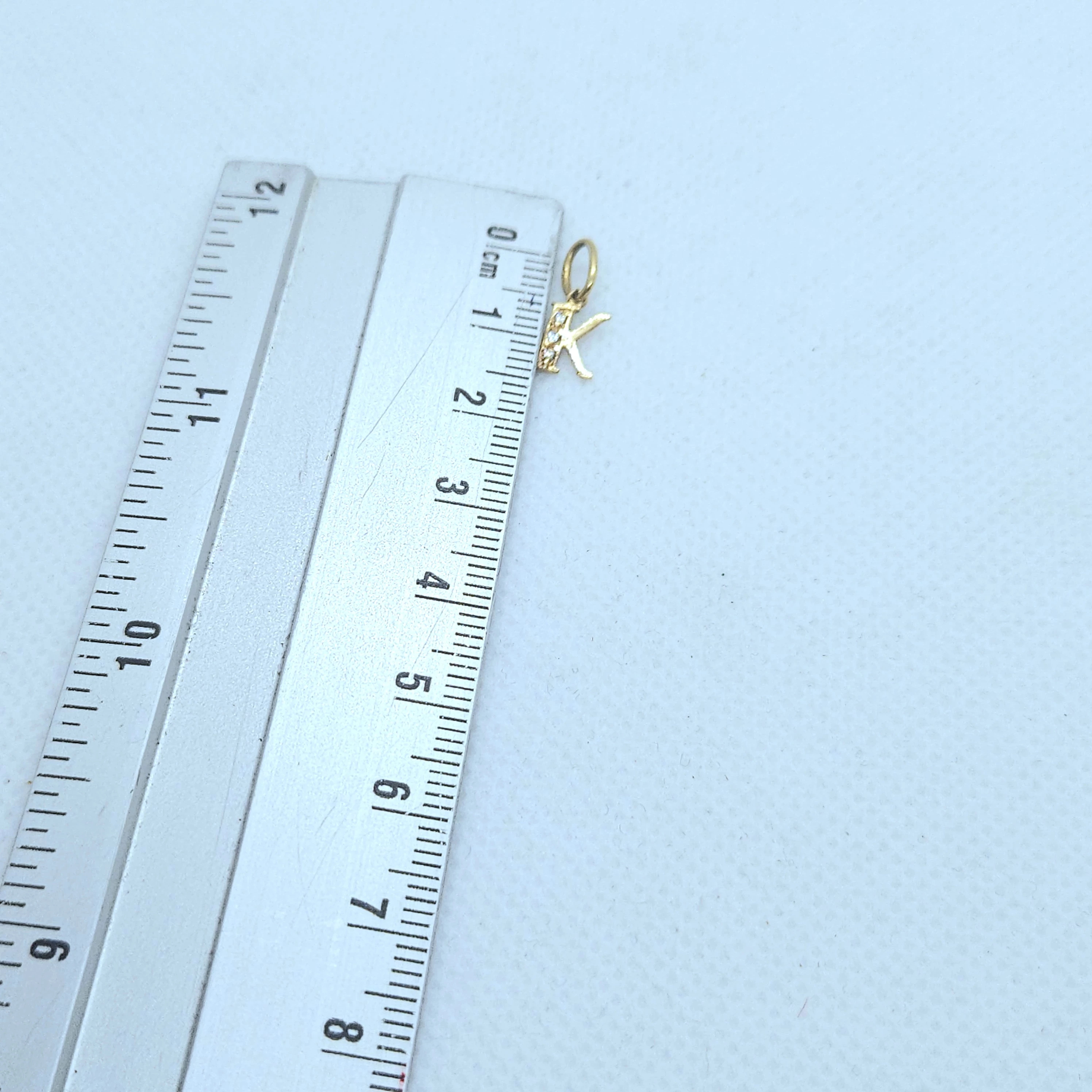 zlota-zawieszka-literka-k-p585-031-g-material-15835-2