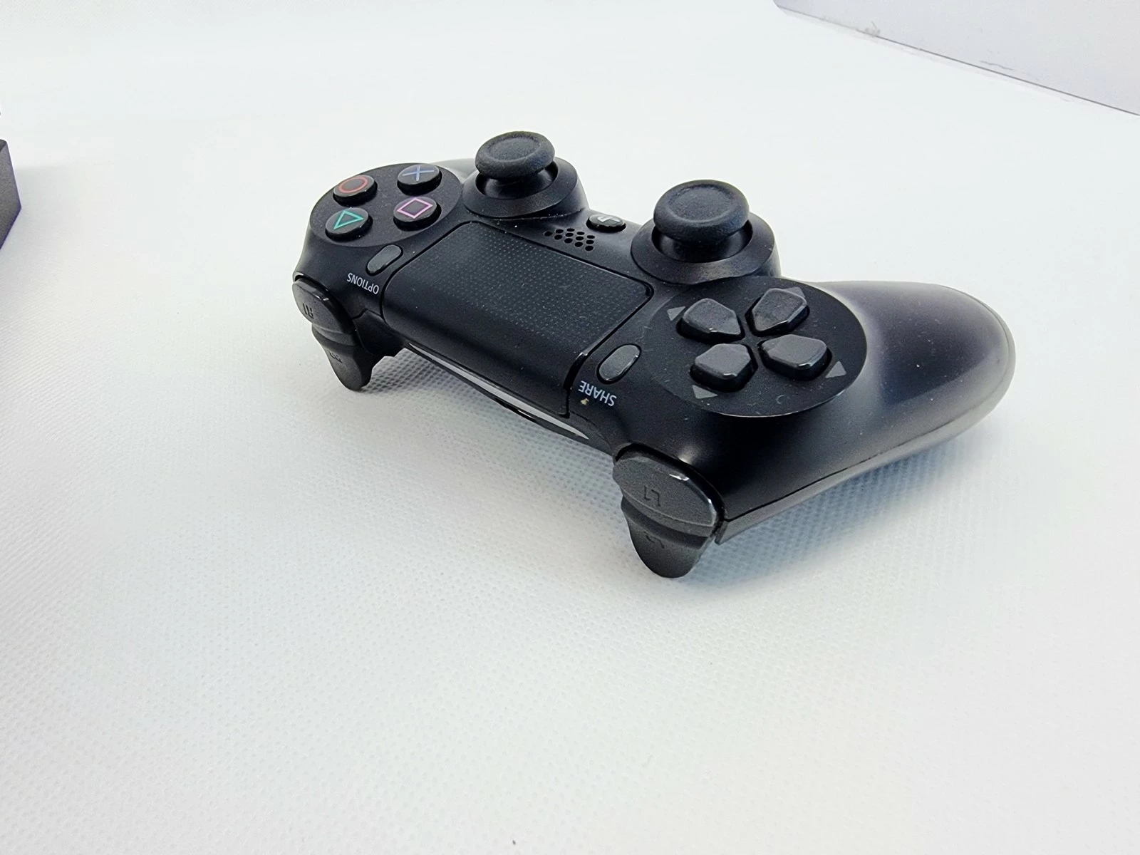 konsola-ps4-slim-1tb-pad-kod-producenta-cuh-2116b