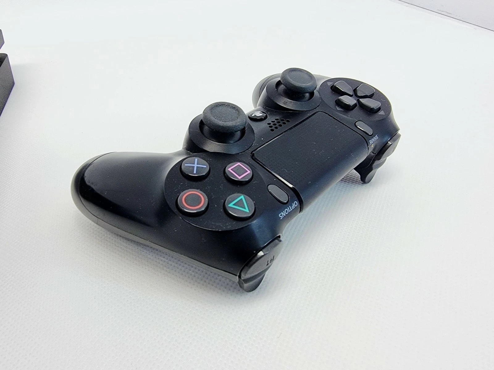 konsola-ps4-slim-1tb-pad-stan-11323-2