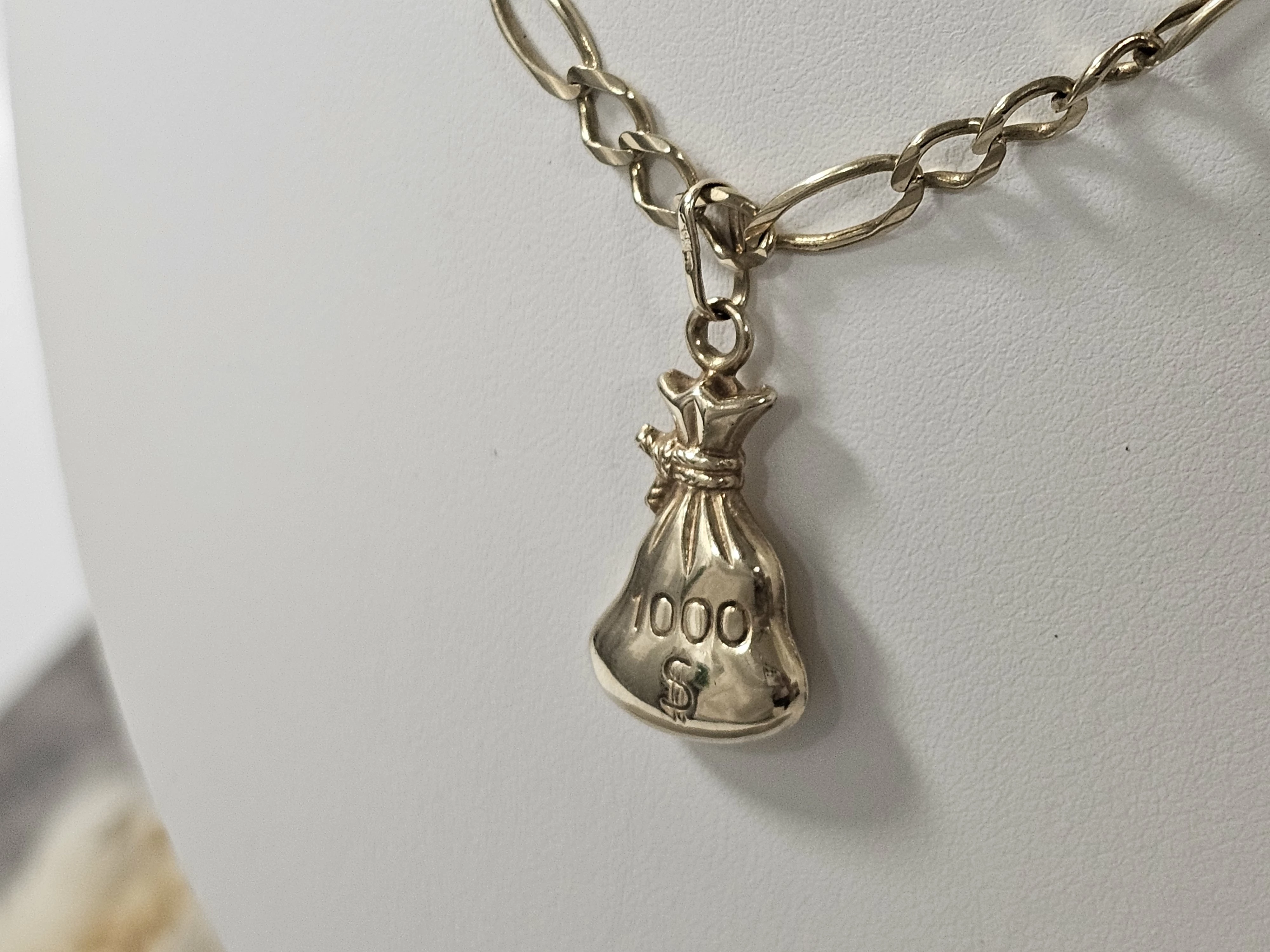 fajna-zlota-zawieszka-worek-waga-166g-proba-585-marka-248811-958954