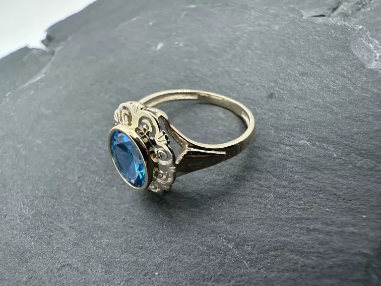 zloty-pierscionek-z-niebieska-cyrkonia-proba-375-9k-roz-17-283g-ean-gtin-5906803466386