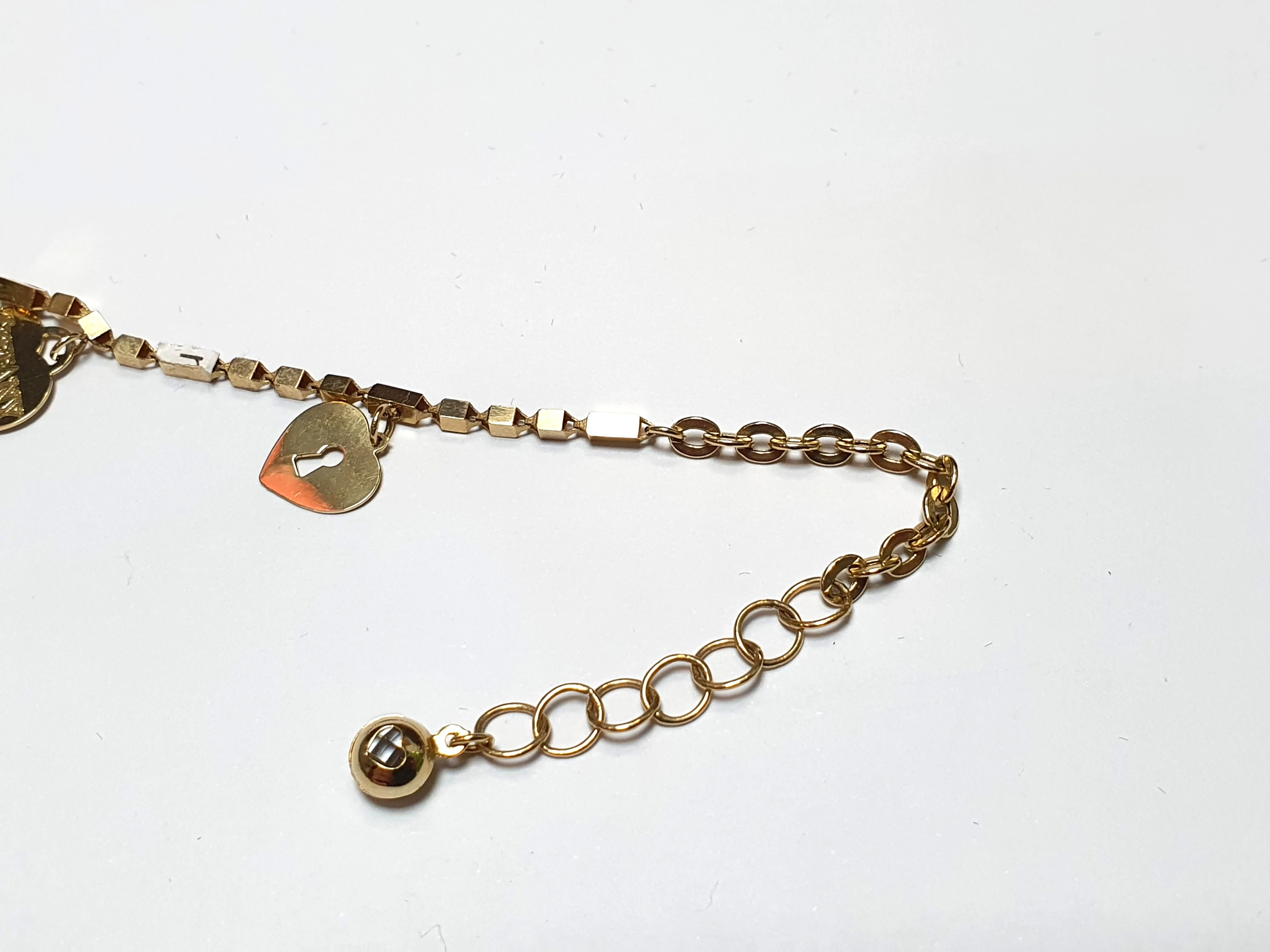 zlota-bransoletka-z-zawieszkami-585-428-g-j-dlugosc-calkowita-215