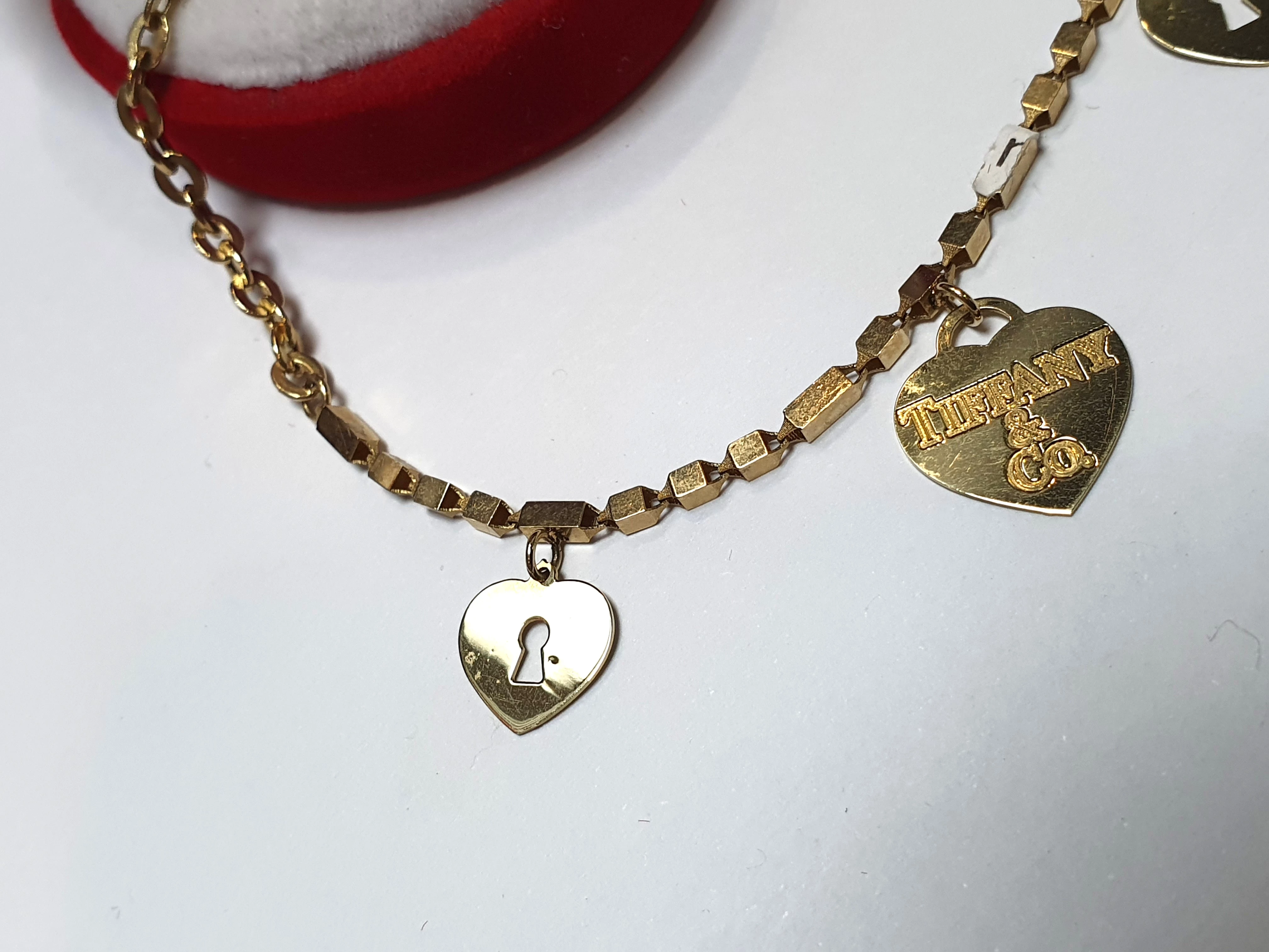 zlota-bransoletka-z-zawieszkami-585-428-g-j-material-15835-2