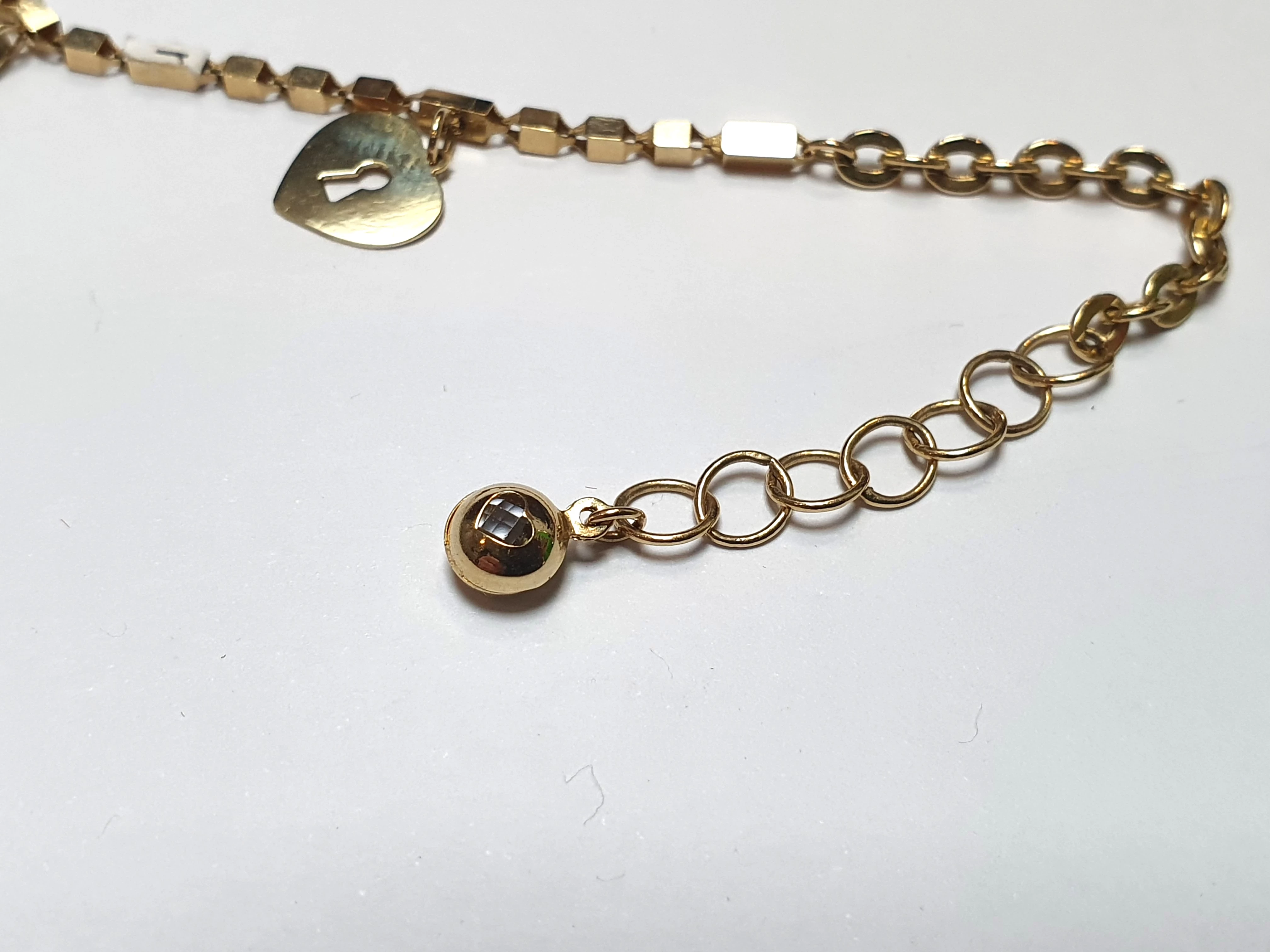 zlota-bransoletka-z-zawieszkami-585-428-g-j-motyw-129129-2