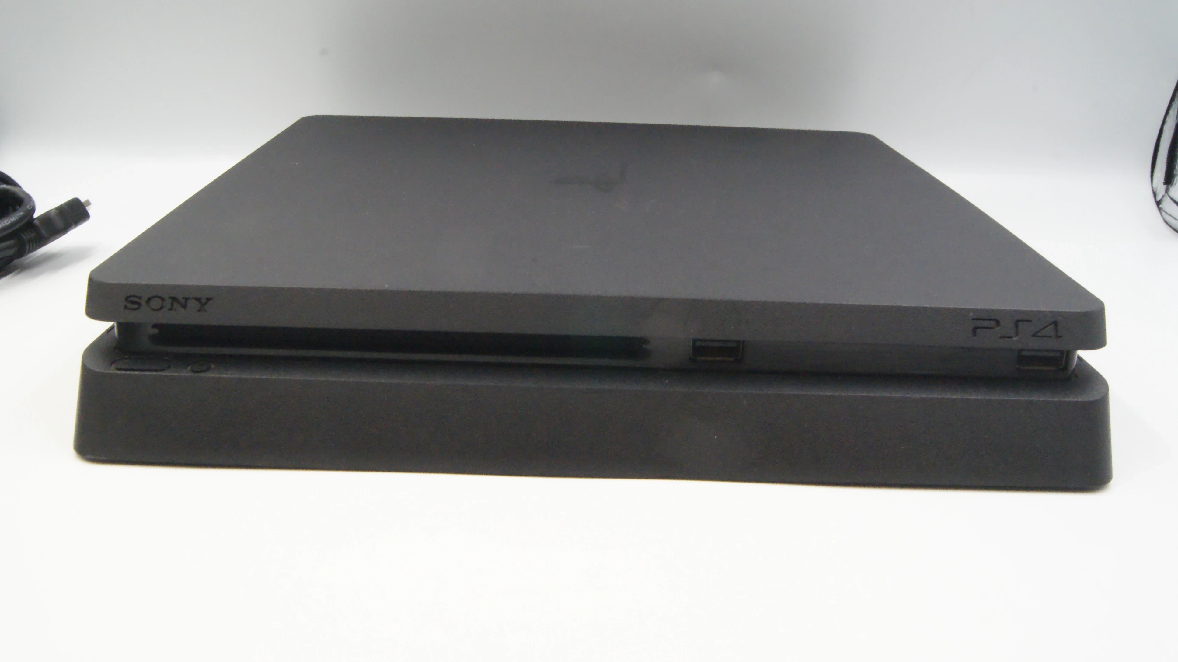 konsola-playstation-4-slim-1tb-pad-ps4-ean-gtin-711719757313