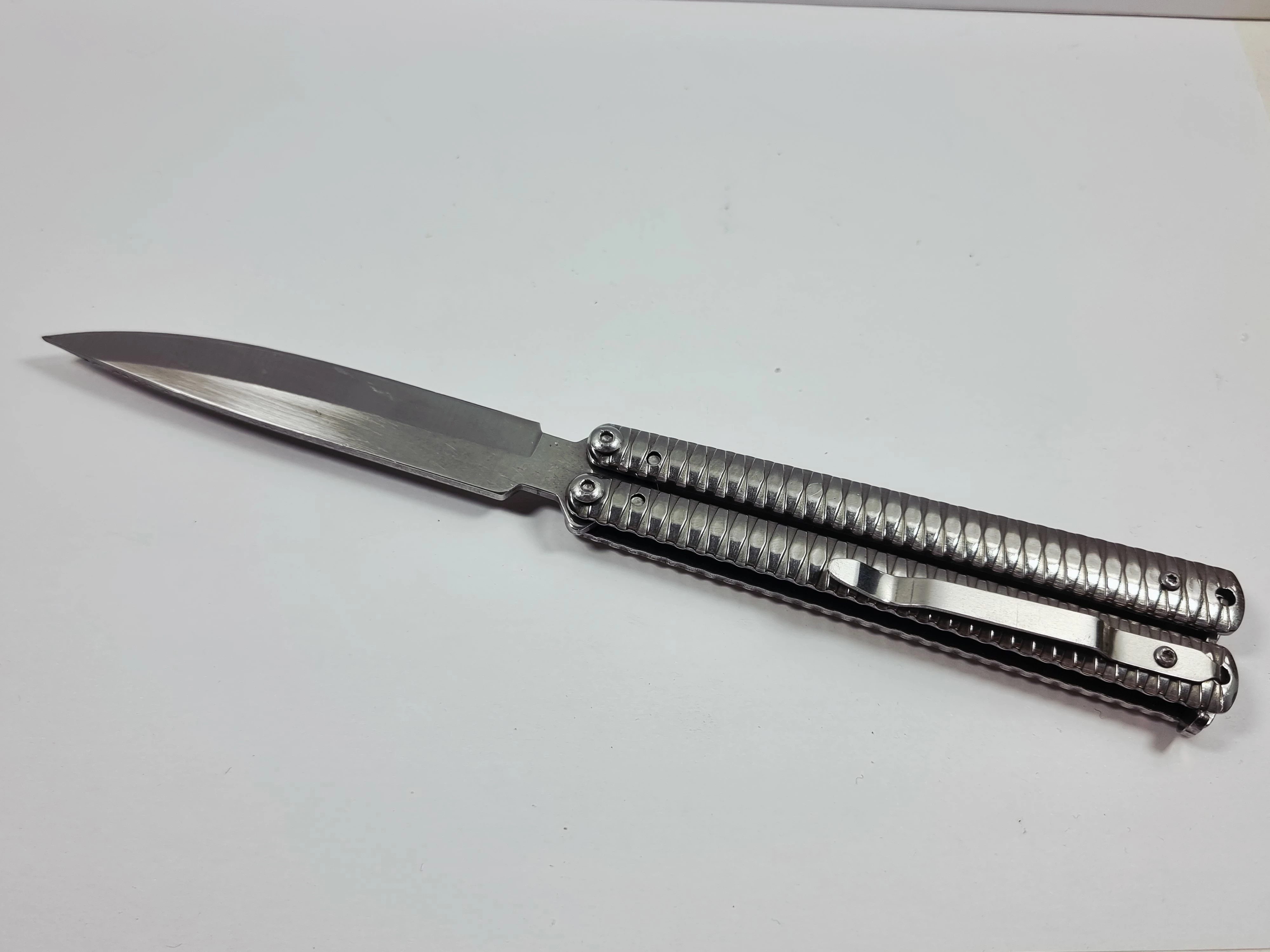 motylek-noz-pulawska-26-warszawa