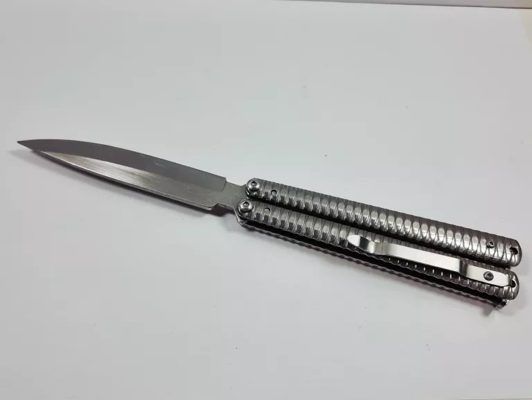 motylek-noz-pulawska-26-warszawa