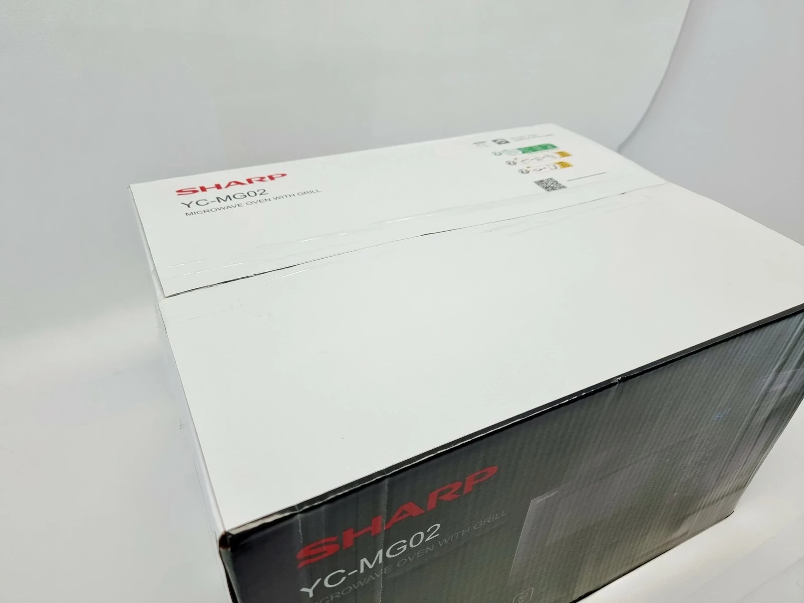 kuchenka-mikrofalowa-sharp-yc-mg02e-b-ean-gtin-4974019142326