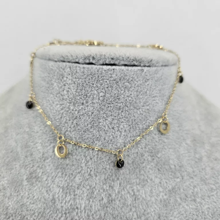 BRANSOLETKA NA KOSTKĘ ZE STALI ZŁOTA