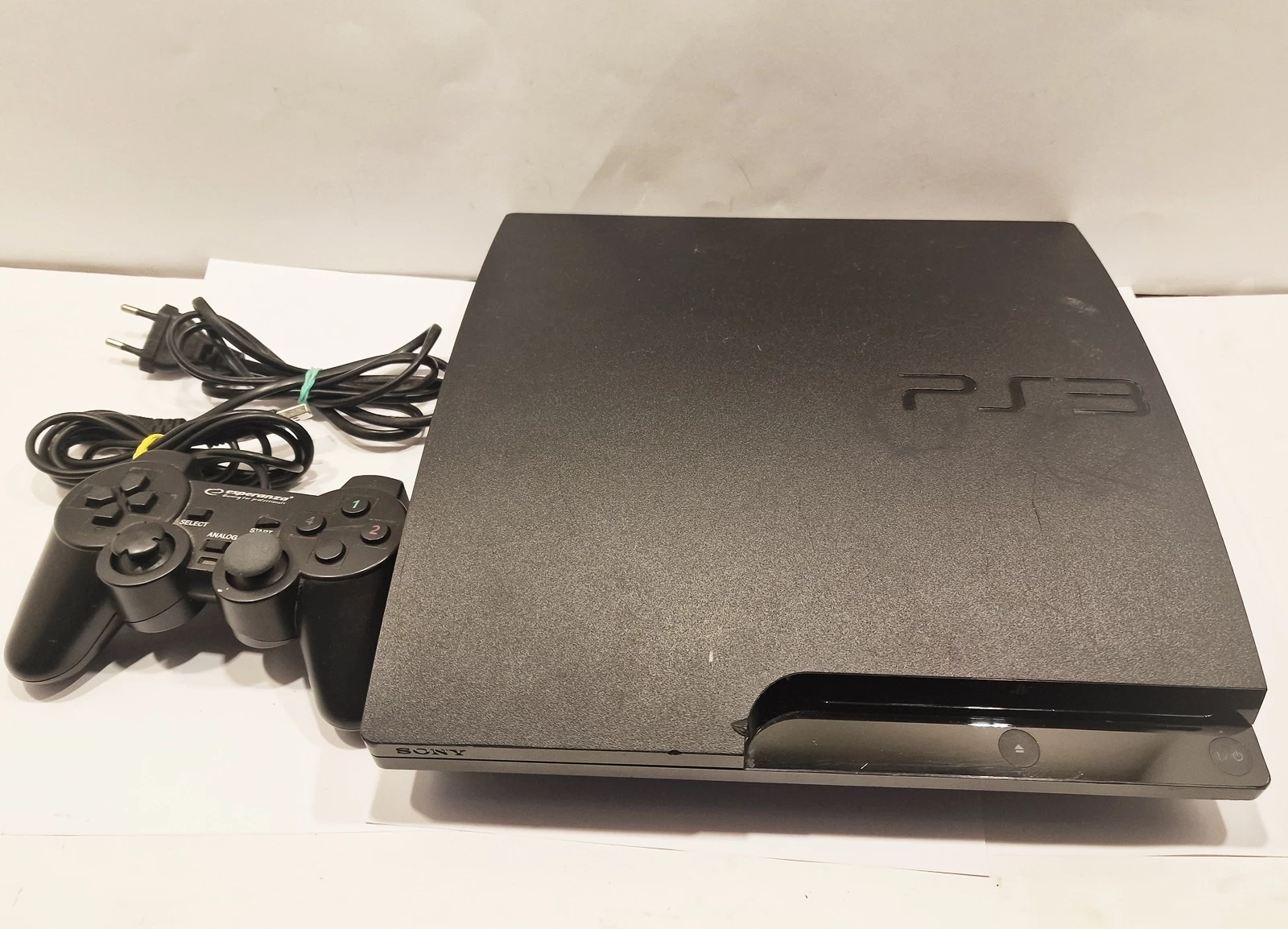 konsola-playstation-3-slim-160gb-pad-obroncow-pokoju-3-gubin