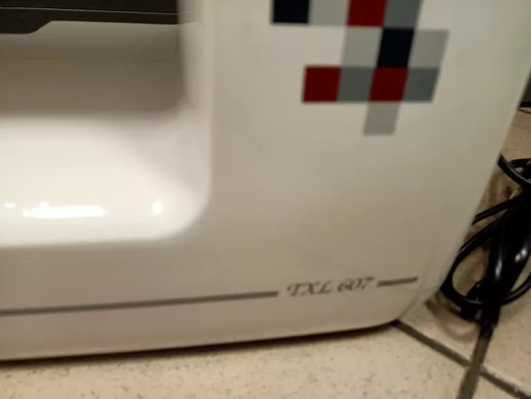 MASZYNA DO SZYCIA JANOME TXL 607