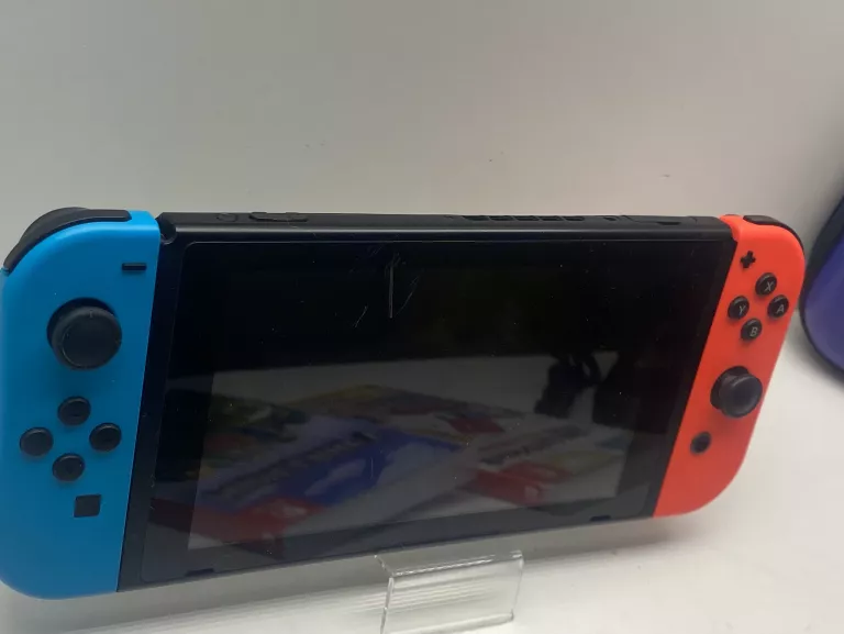 NINTENDO SWITCH ŁADOWARKA DWIE GRY ETUI MARIO OKAZJA