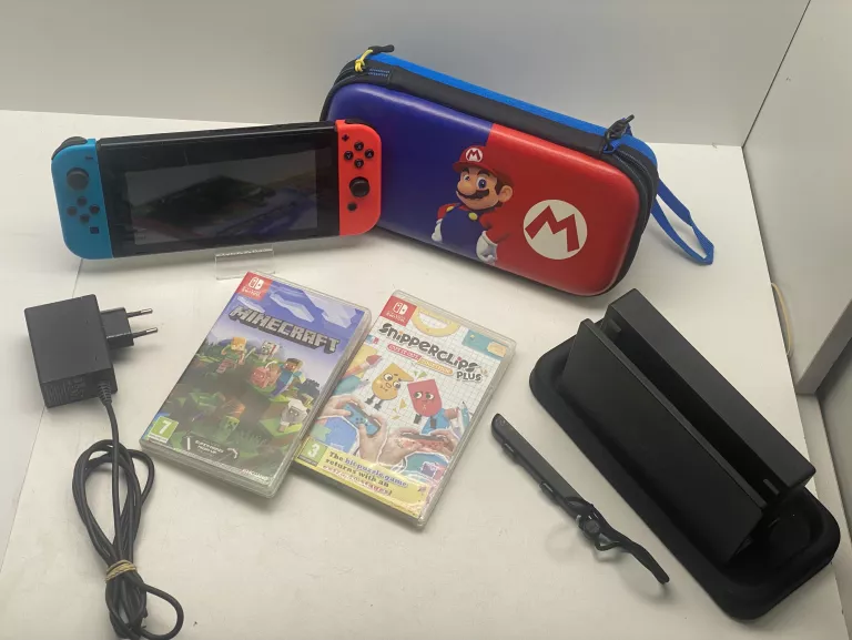 NINTENDO SWITCH ŁADOWARKA DWIE GRY ETUI MARIO OKAZJA