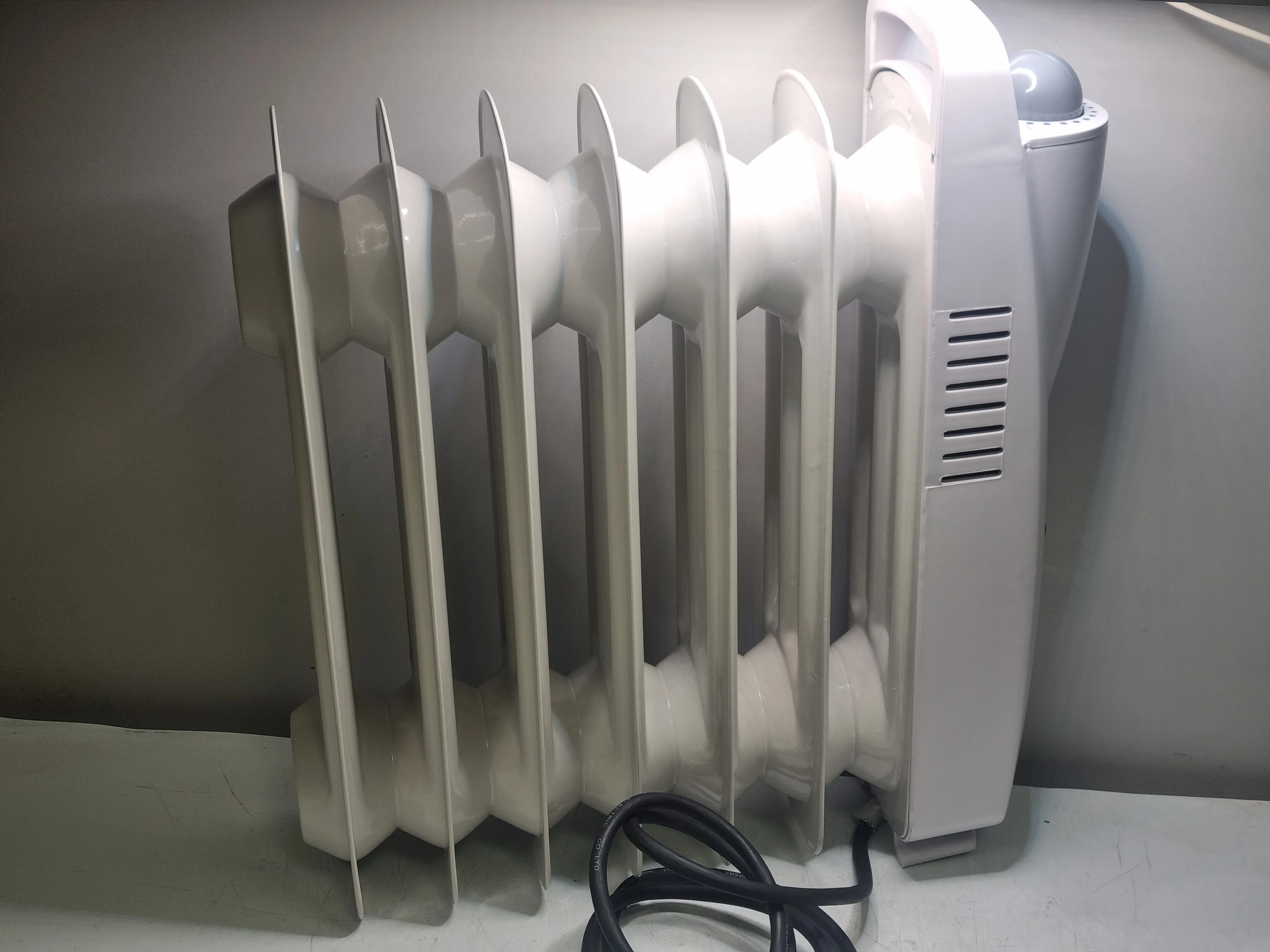 grzejnik-olejowy-tesco-ofr86-700w-stan-11323-238058