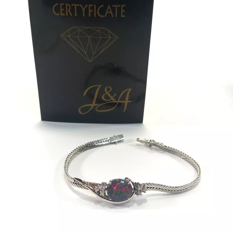 BRANSOLETKA BIAŁE ZŁOTO Z DIAMENTAMI I OPALEM PR.585 DŁ.18CM