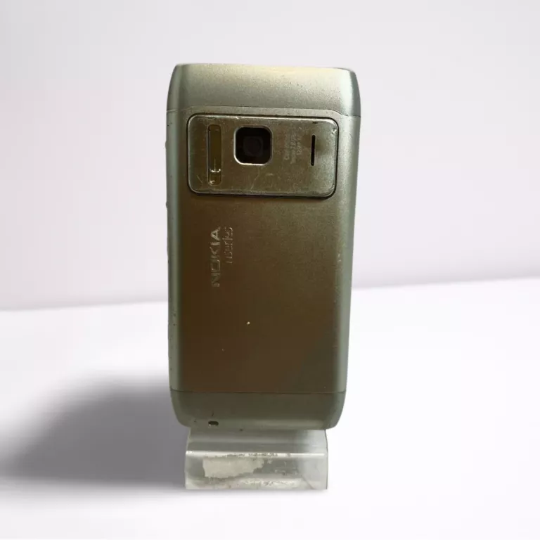 TELEFON NOKIA N8-00 Z WYŁAMANĄ KLAPKĄ NA KARTY SIM
