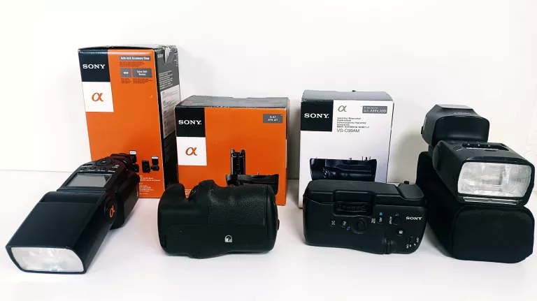 ORGROMNY ZESTAW APARAT SONY A77, SONY A99, 8 OBIEKTYWÓW, GRIPY,LAMPY I INN
