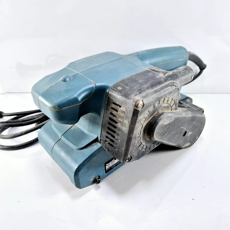 MAKITA SZLIFIERKA TAŚMOWA SIECIOWA 76MM 650W Z WORKIEM NA PYŁ 9910 74X457