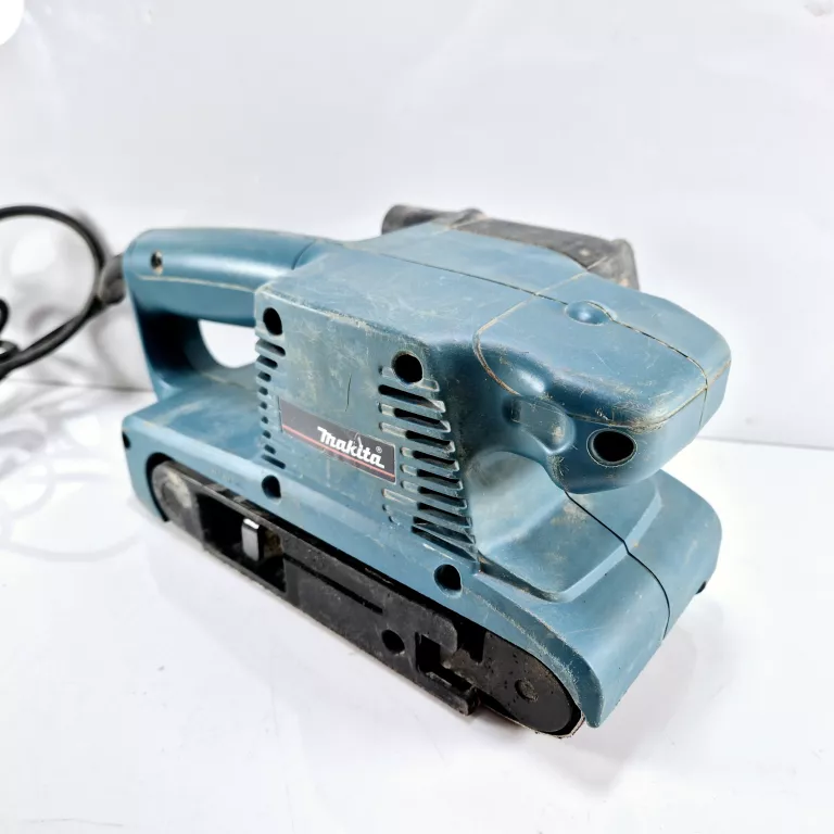 MAKITA SZLIFIERKA TAŚMOWA SIECIOWA 76MM 650W Z WORKIEM NA PYŁ 9910 74X457