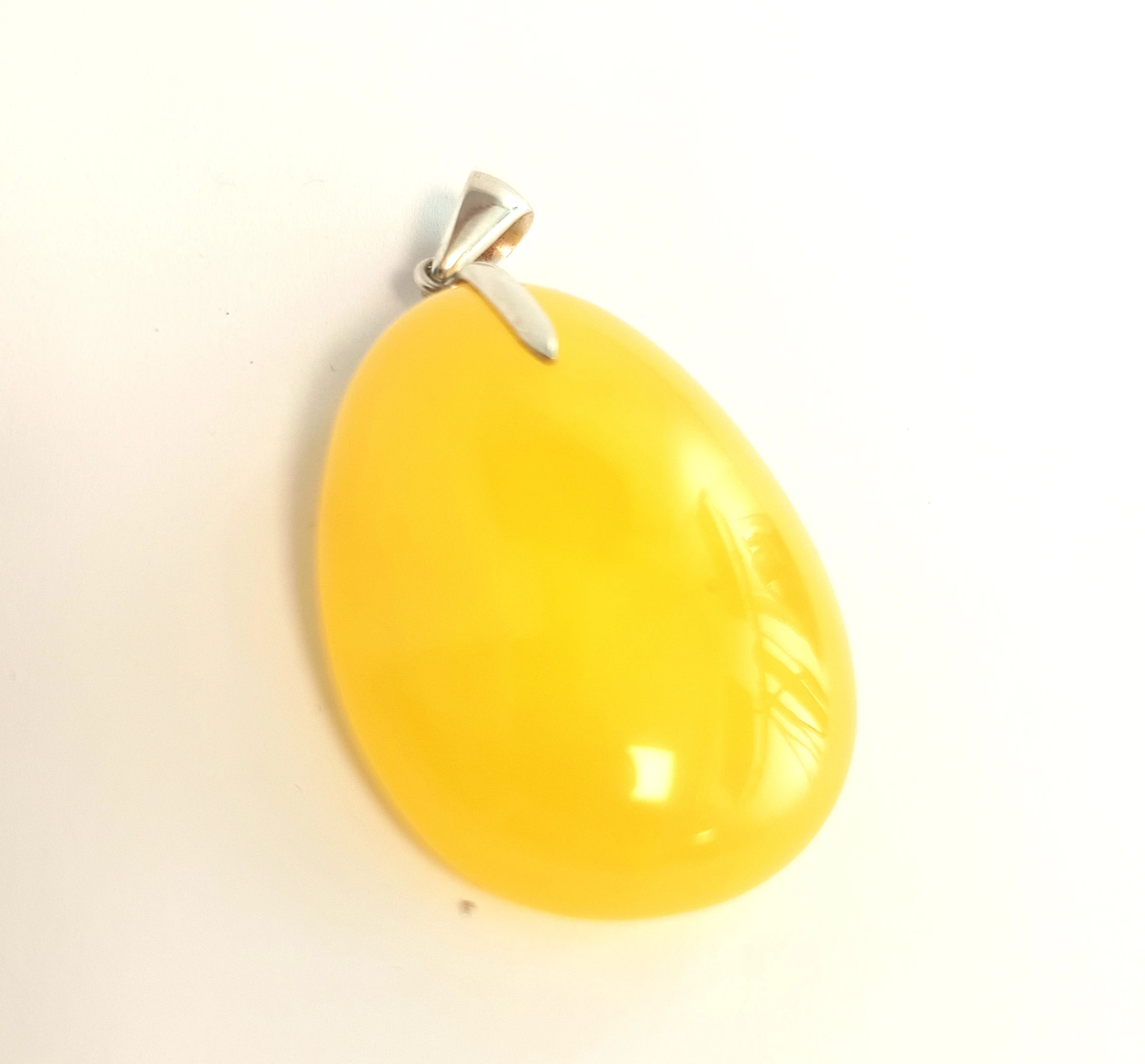 srebro-zawieszka-z-bursztynem-o-kolorze-miodowym-waga-1662-ean-gtin-5904209202973