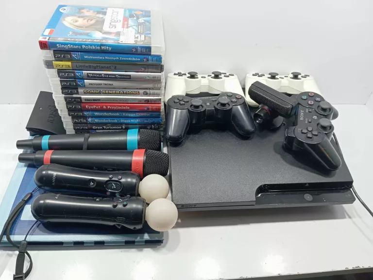 KONSOLA PS3 Z MEGA ZESTAWEM 13 GIER MOVE 4 PADY SING STAR WONDERBOOK
