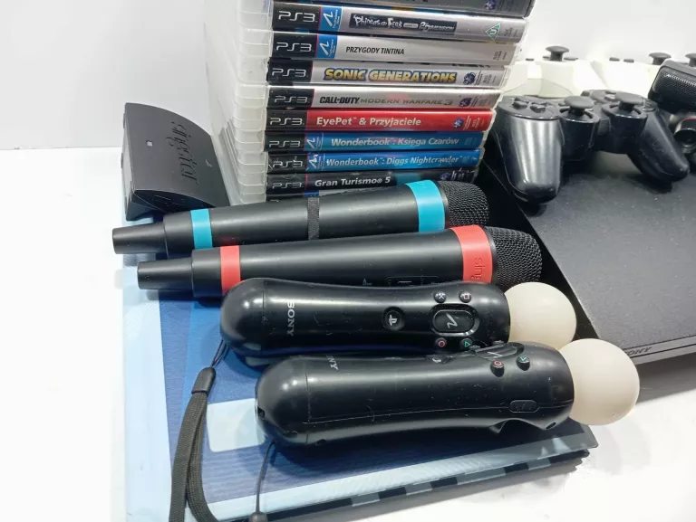 KONSOLA PS3 Z MEGA ZESTAWEM 13 GIER MOVE 4 PADY SING STAR WONDERBOOK