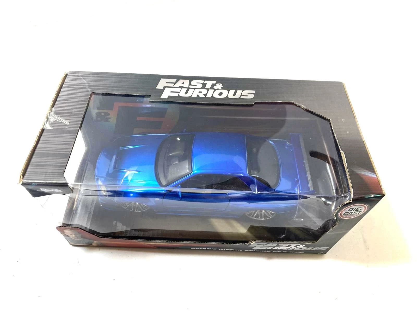 jada-fast-furious-nissan-skyline-gt-r-r34-124-die-cast-brian-ean-gtin-4006333070754