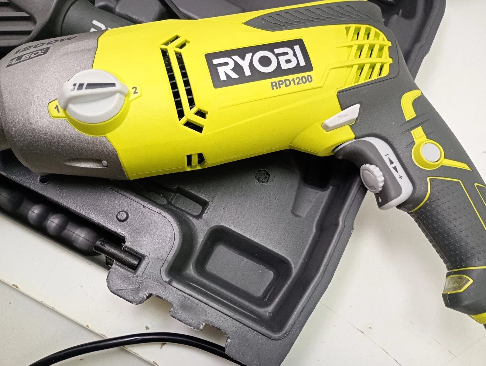 ryobi-rpd1200-k-1200w-wiertarka-udarowa-walizka-typ-uchwytu-129629-1
