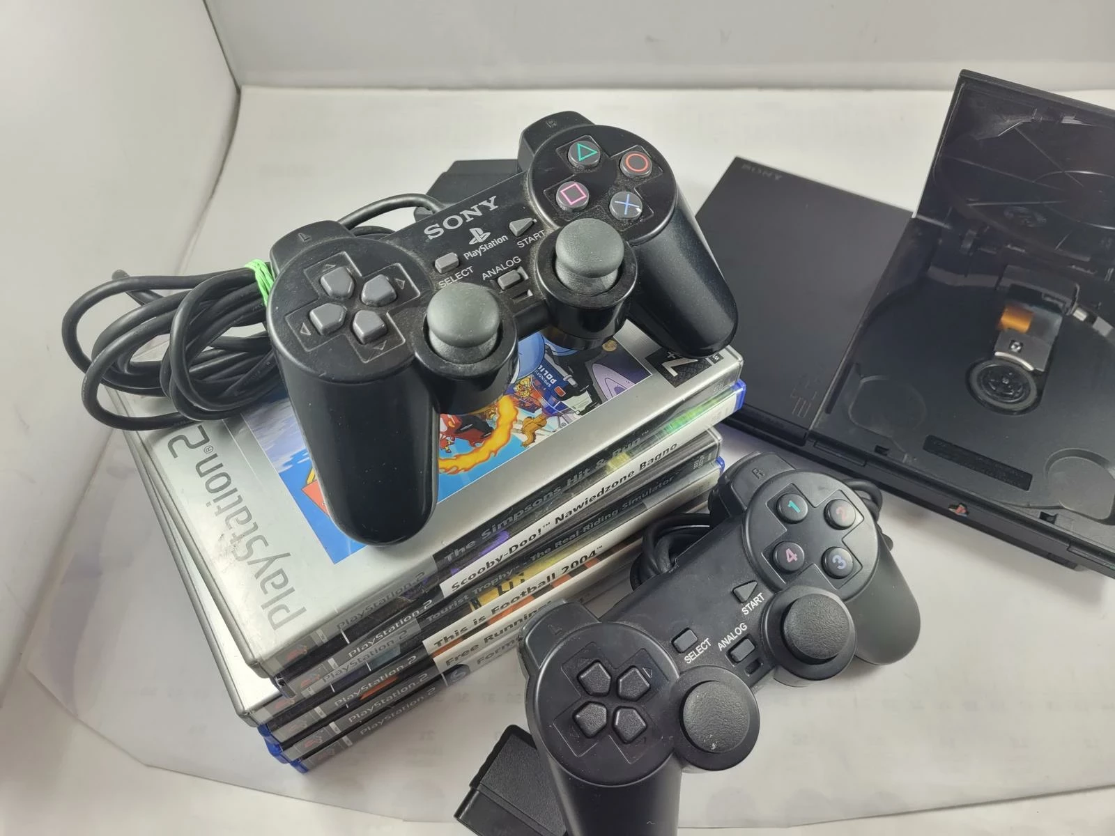 konsola-sony-ps2-slim-2-pady-gry-product-id-21957c13-b955-4180-8d9d-3ebf245a2517