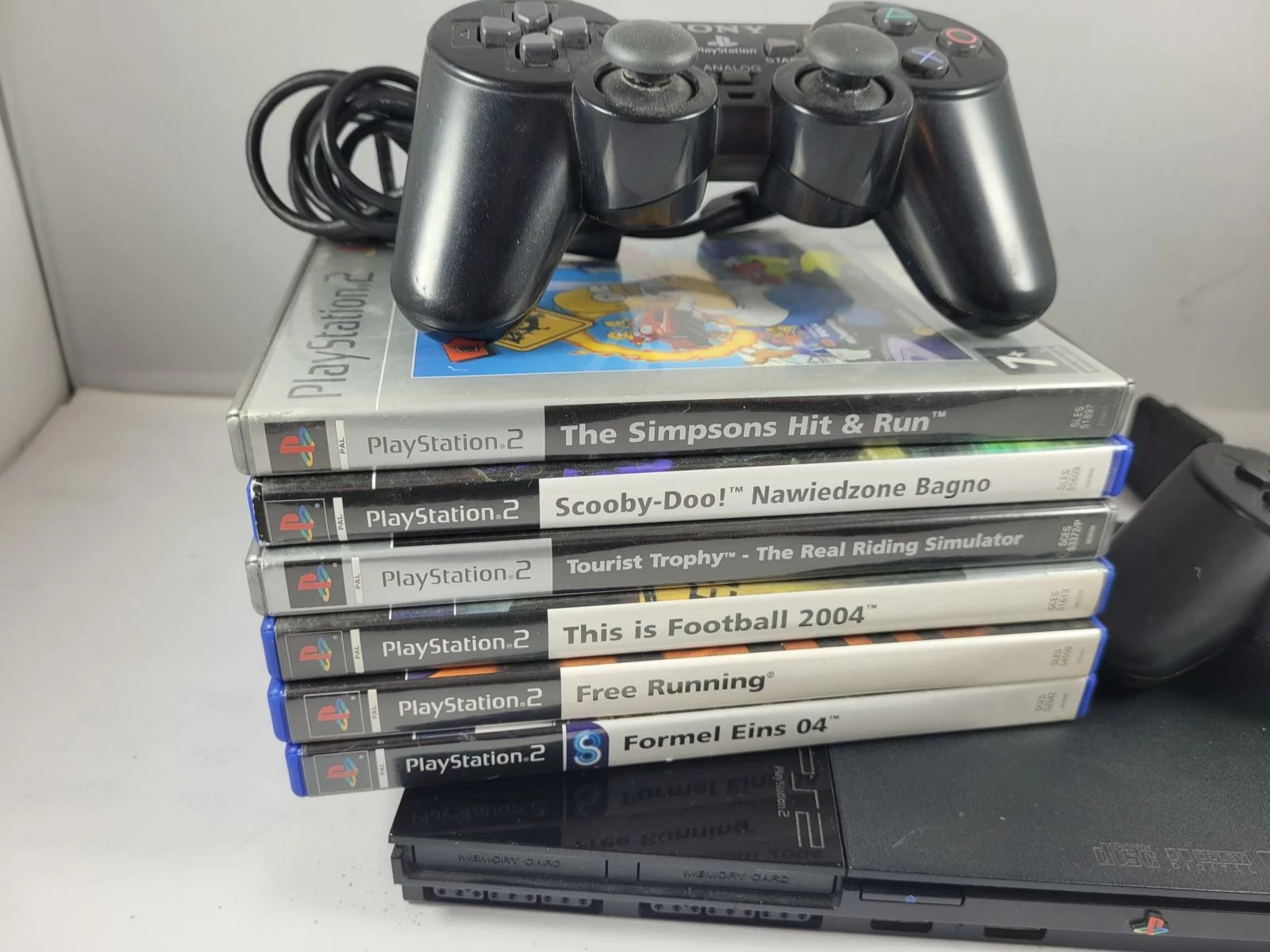 konsola-sony-ps2-slim-2-pady-gry-stan-11323-2