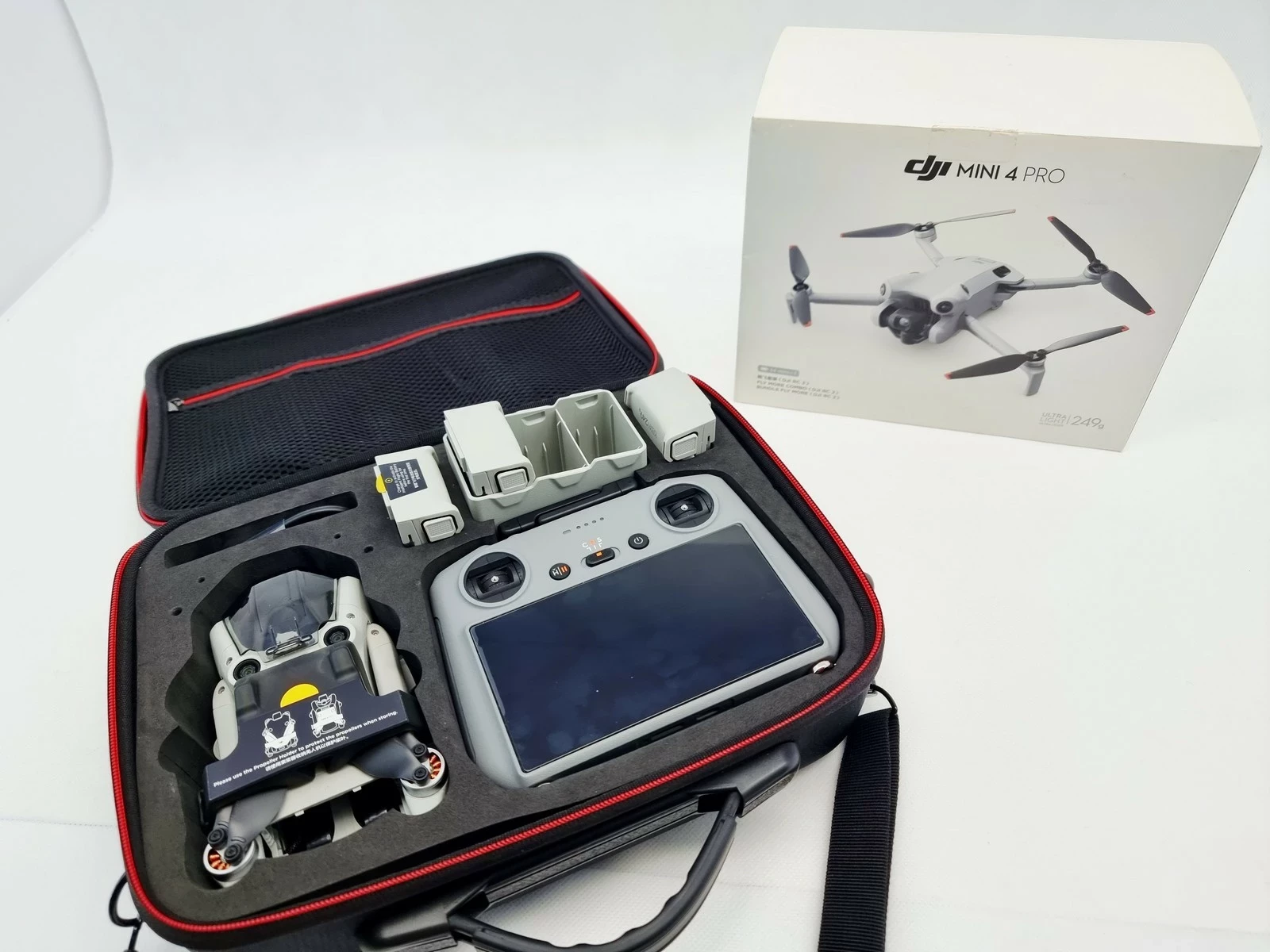 dron-dji-mini-4-pro-fly-more-combo-rc-2-wideo-4k-ean-gtin-6937224103047